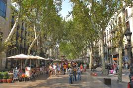  Inspiration: "La Rambla" is a 0.75-mile long, tree-lined pedestrian mall in Barcelona, Spain.  Originally a sewage-filled stream bed, the street's iconic trees were first added in 1703.  Two narrow service roads flank (but never cross) a central pedestrian zone. (Photo source: MyTravelPhotos.net)